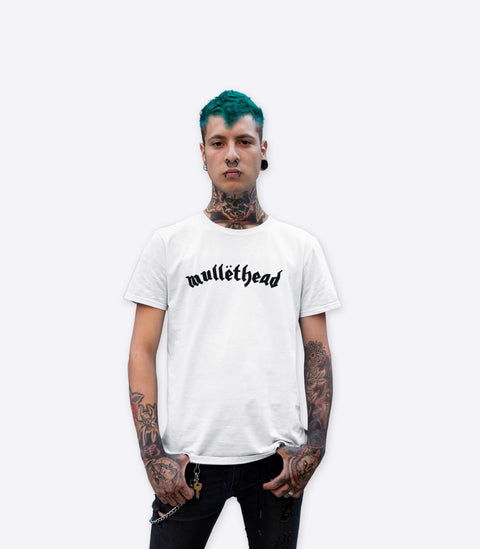 Tattooed punk guy modelling a parody white tshirt of the Motorhead logo designed by Amok