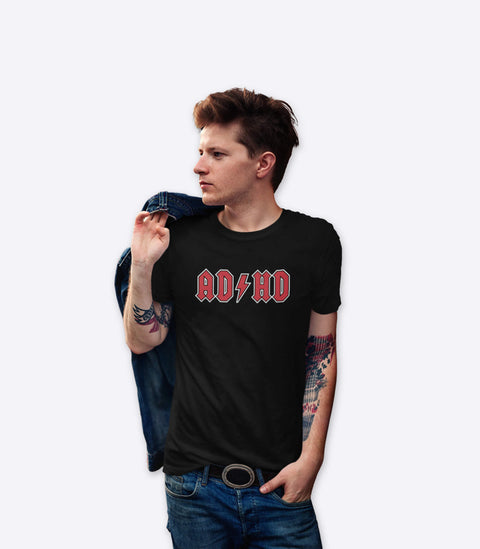 Tattooed rock dude modelling a spoof parody tshirt with the classic AD/DC logo designed by Amok